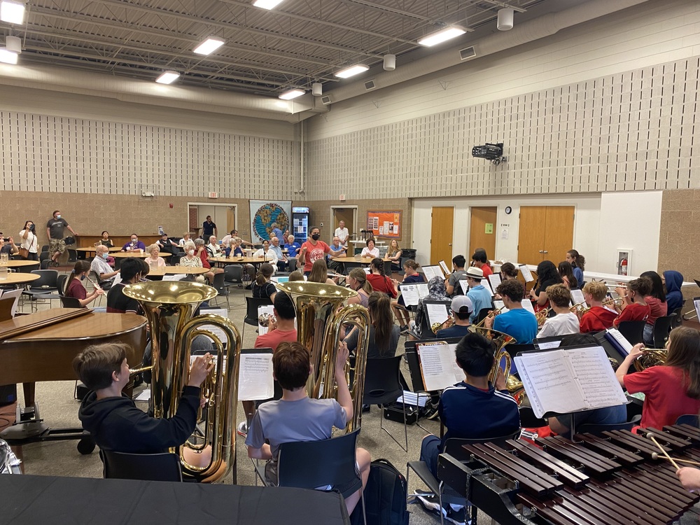 Kromrey students playing band instruments in the gym